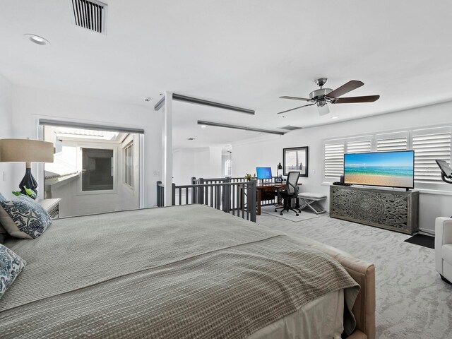 bedroom featuring ceiling fan and light colored carpet