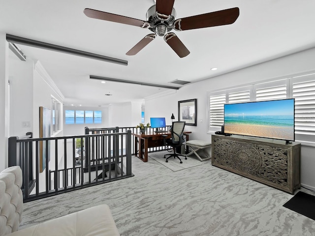 office area with crown molding, ceiling fan, and light colored carpet