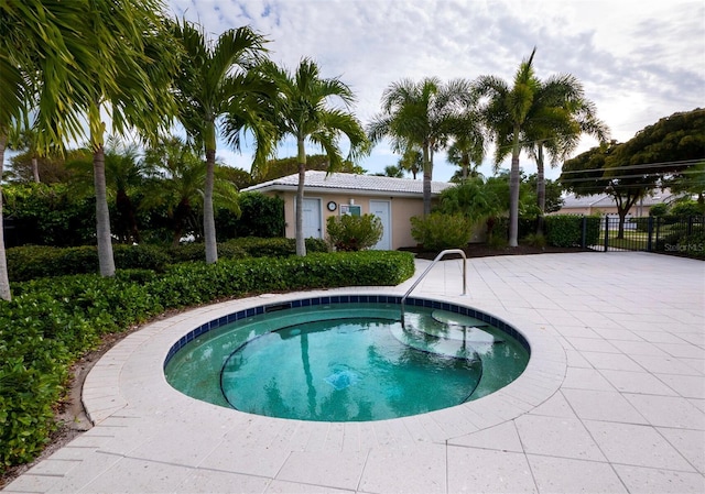 view of swimming pool featuring a patio area