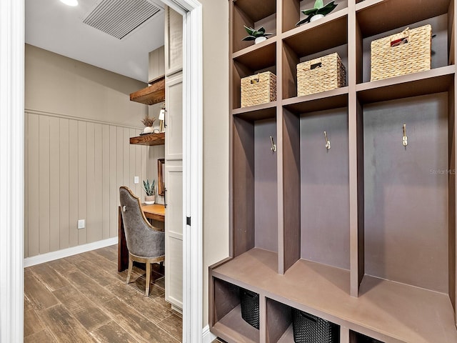 mudroom with dark hardwood / wood-style floors