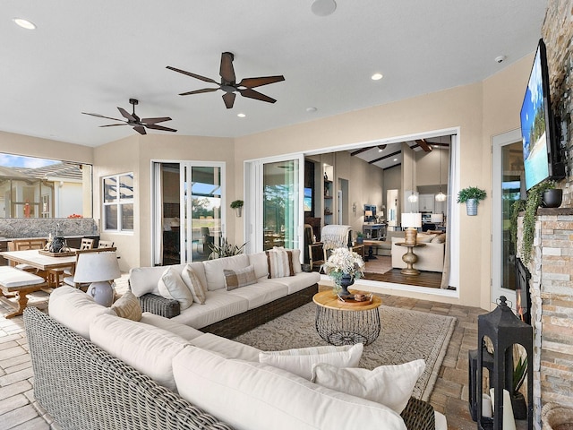 living room featuring ceiling fan