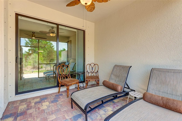 view of patio / terrace featuring ceiling fan