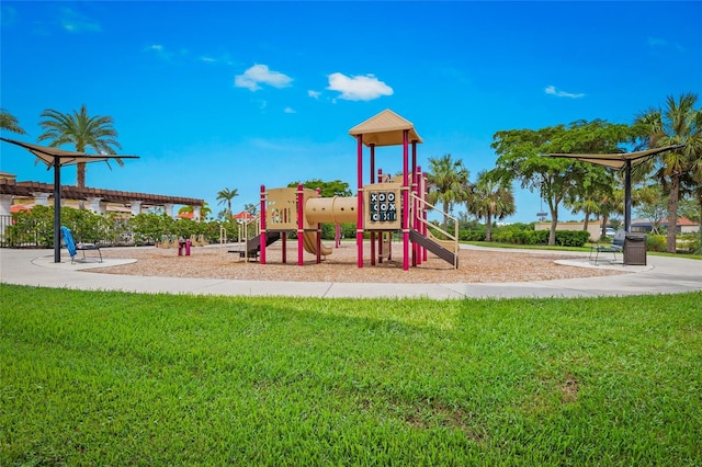 view of jungle gym with a lawn