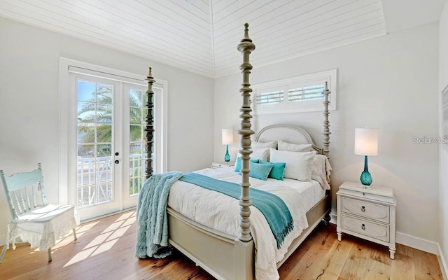 bedroom featuring access to outside, french doors, wood ceiling, and light hardwood / wood-style floors