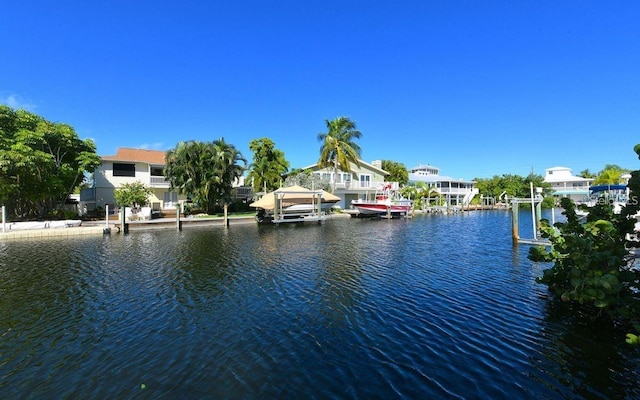 property view of water featuring a dock