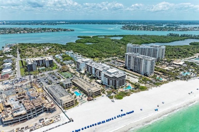 aerial view with a water view and a view of the beach