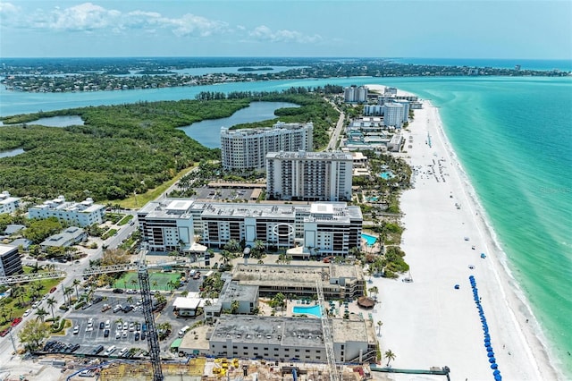 bird's eye view with a view of the beach and a water view