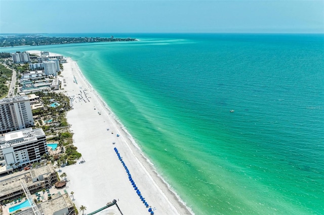 aerial view with a beach view and a water view