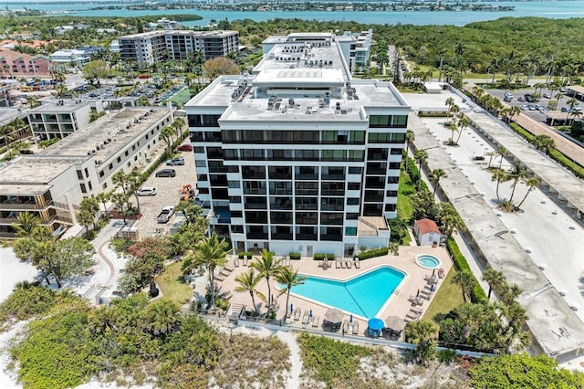 birds eye view of property featuring a water view