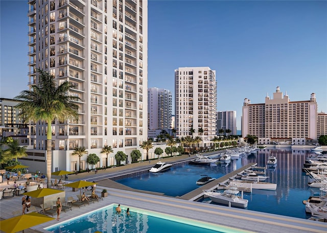 view of swimming pool featuring a water view