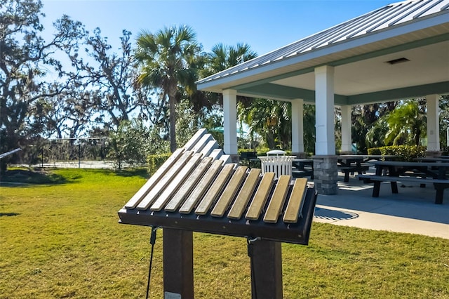 view of home's community featuring a gazebo, a yard, and a patio