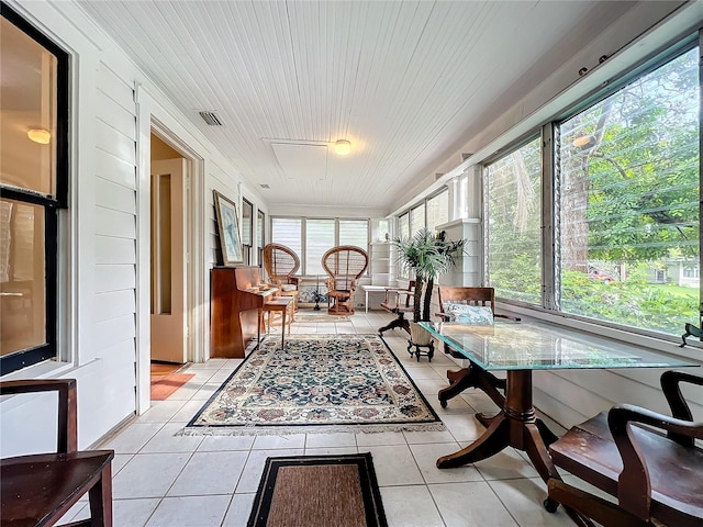 sunroom featuring wood ceiling