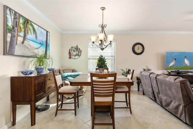 6517 Willowshire Way, Bradenton, FL 34212 - dining room featuring a chandelier, ornamental molding, light tile patterned flooring, and baseboards
