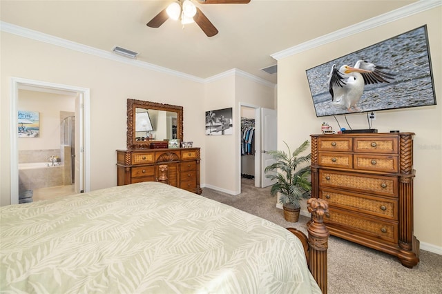 6517 Willowshire Way, Bradenton, FL 34212 - carpeted bedroom featuring ornamental molding, a walk in closet, a closet, baseboards, and ceiling fan