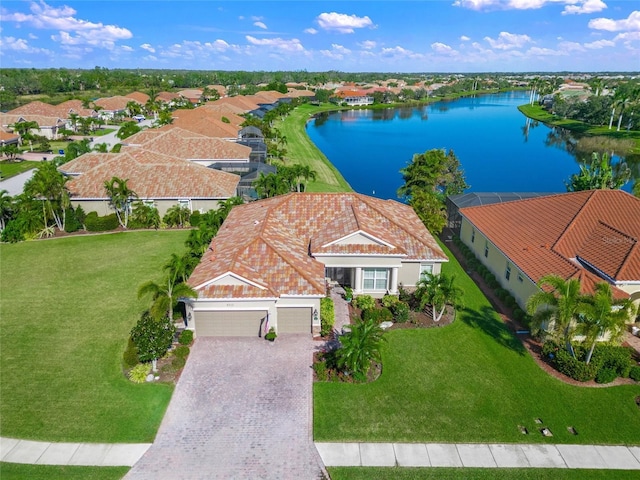 drone / aerial view with a water view