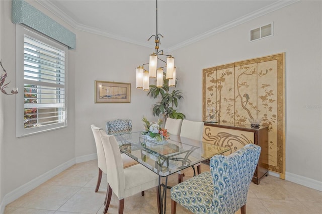 dining area with ornamental molding and light tile patterned floors