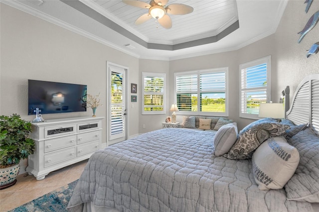 bedroom featuring ceiling fan, access to exterior, crown molding, and multiple windows