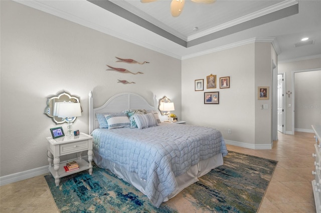 tiled bedroom with a tray ceiling, ceiling fan, and crown molding