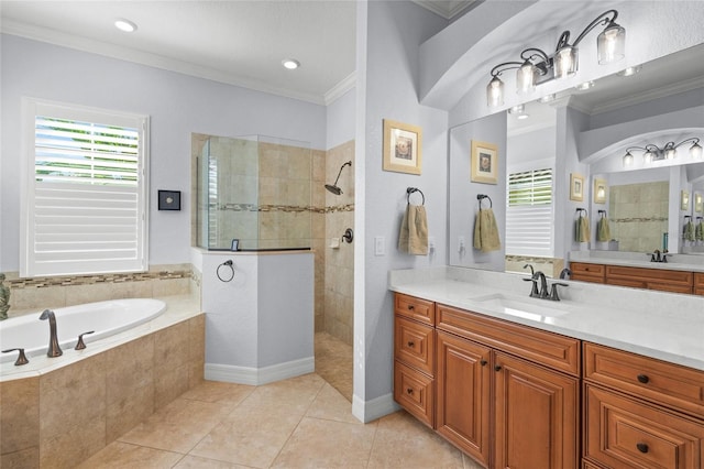 bathroom with tile patterned floors, vanity, plus walk in shower, and ornamental molding