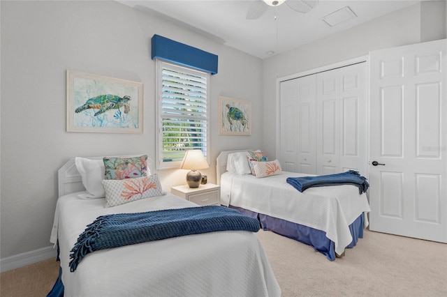 bedroom featuring carpet, a closet, and ceiling fan