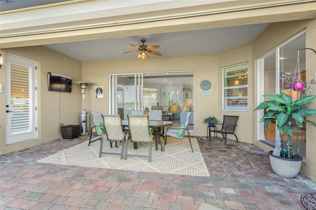 view of patio / terrace featuring ceiling fan