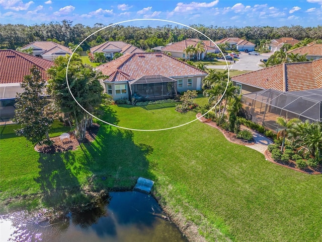 drone / aerial view with a water view