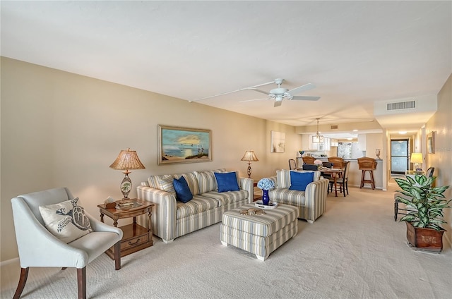 5911 Midnight Pass Rd Unit 504, Sarasota, FL 34242 - living room featuring light carpet and a ceiling fan