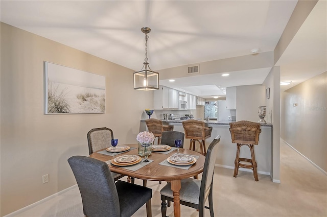 view of carpeted dining room