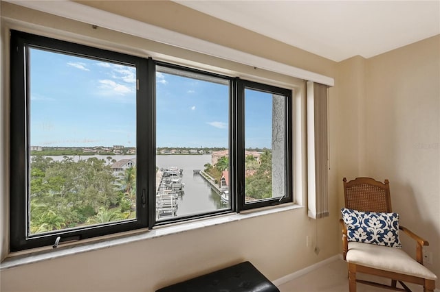 5911 Midnight Pass Rd Unit 504, Sarasota, FL 34242 - sitting room with a water view and plenty of natural light