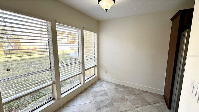 view of tiled spare room