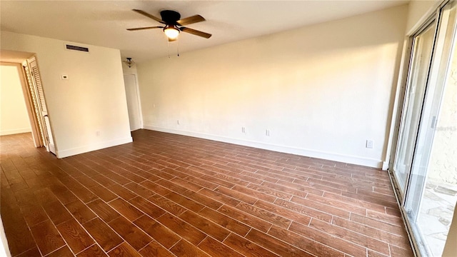 interior space featuring ceiling fan and dark wood-type flooring