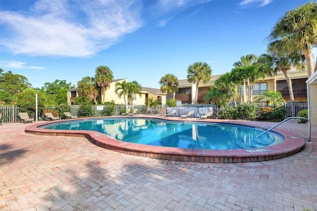 view of swimming pool featuring a patio area