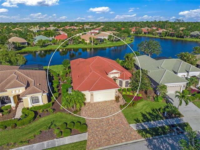 drone / aerial view with a water view