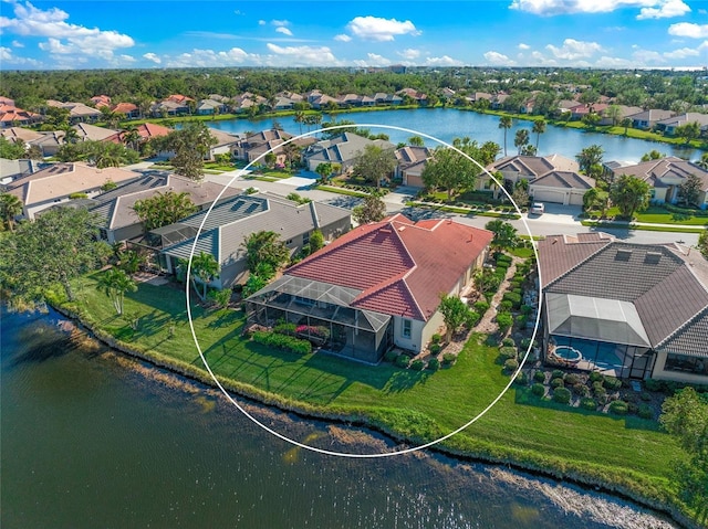 bird's eye view with a water view