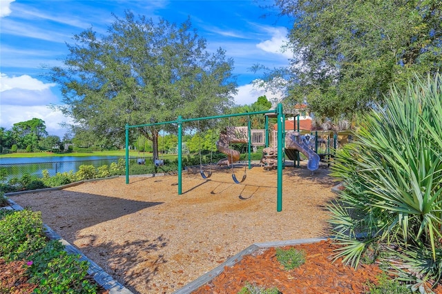 view of jungle gym with a water view