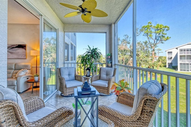 sunroom / solarium with ceiling fan