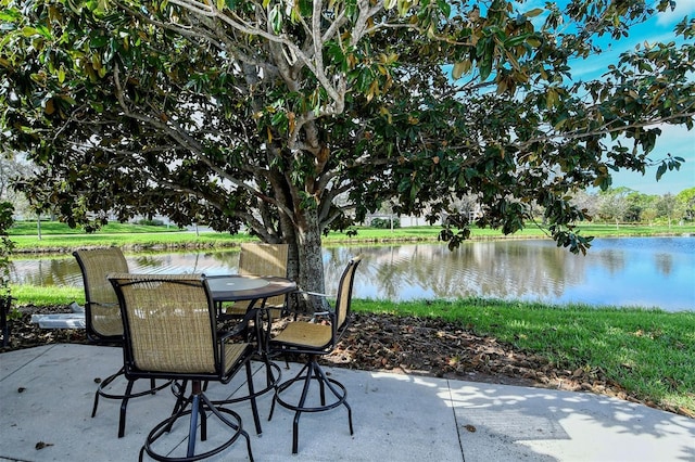 view of patio / terrace with a water view