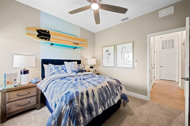 carpeted bedroom with ceiling fan