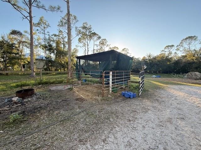 view of outdoor structure featuring a rural view