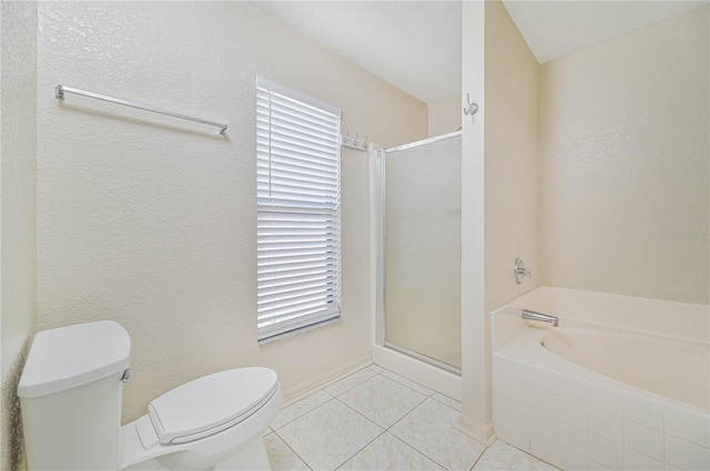 bathroom featuring tile patterned floors, a healthy amount of sunlight, shower with separate bathtub, and toilet