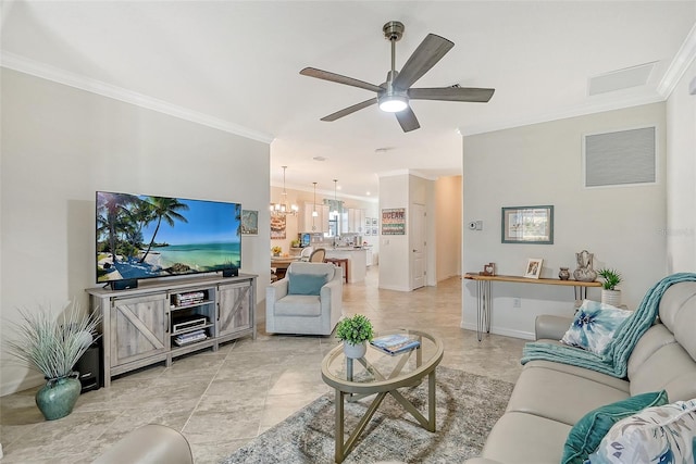 living area featuring ceiling fan with notable chandelier, visible vents, baseboards, and ornamental molding