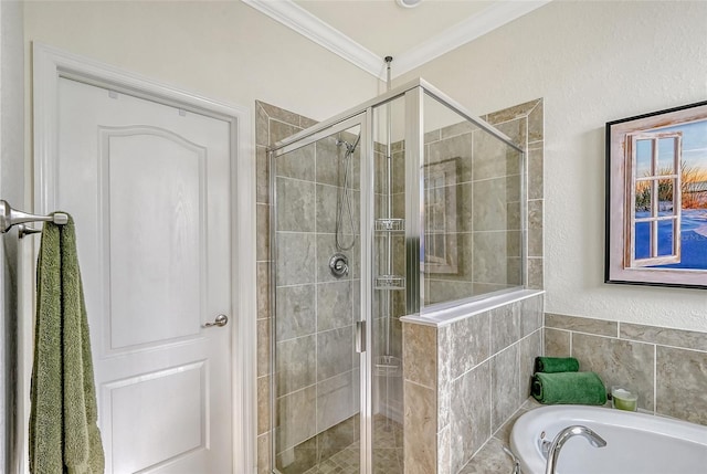 bathroom featuring separate shower and tub and crown molding