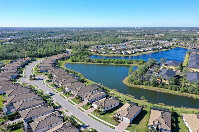 aerial view featuring a water view and a residential view