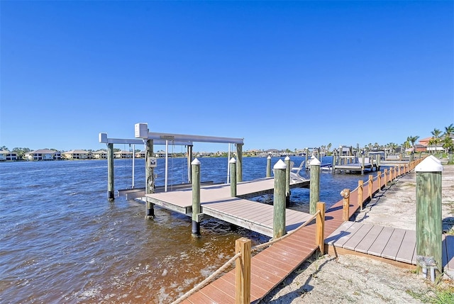 dock area featuring a water view