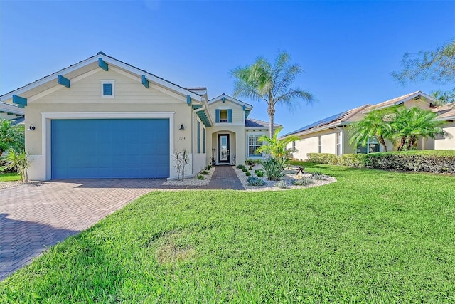 ranch-style home with a garage and a front yard