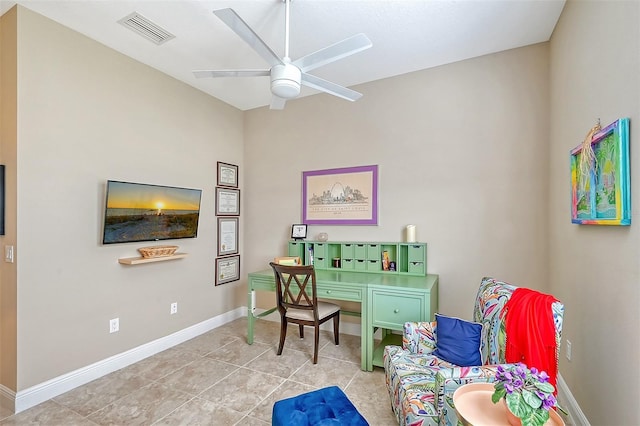 tiled office featuring ceiling fan