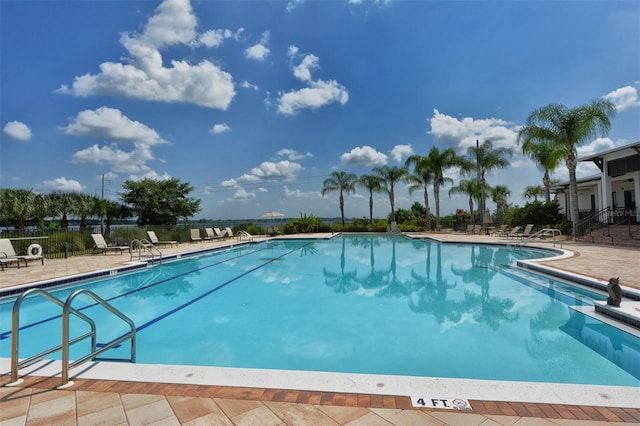 view of swimming pool featuring a patio