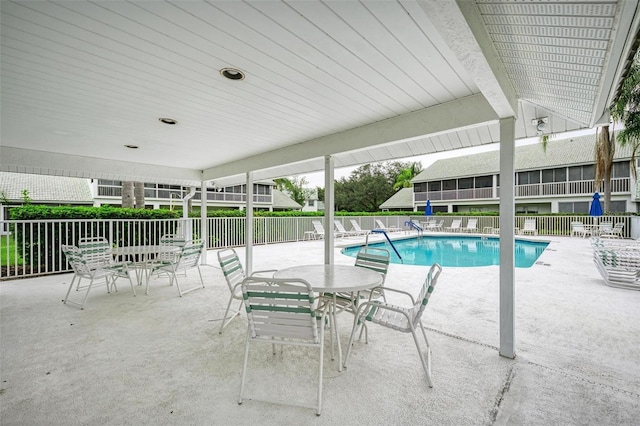 view of pool featuring a patio