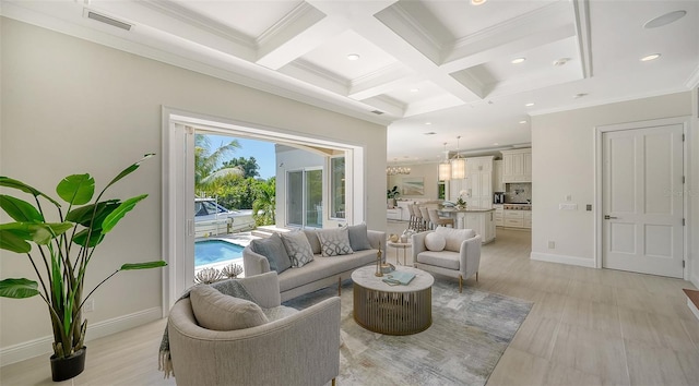 living room with beamed ceiling, light wood-type flooring, ornamental molding, and coffered ceiling