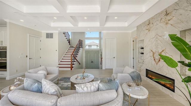 510 Bowsprit Ln, Longboat Key, FL 34228 - living room featuring stairs, beam ceiling, a premium fireplace, coffered ceiling, and recessed lighting